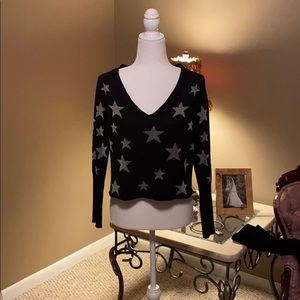 Chaser black with silver stars V-neck sweater